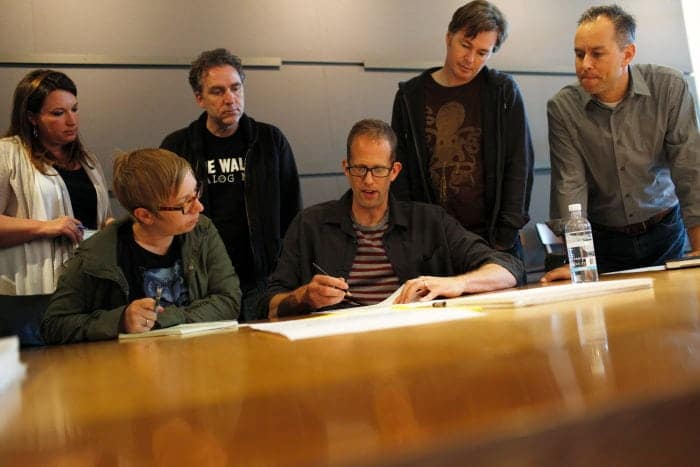 A day in the life of "Inside Out" Director Pete Docter (center) with (left to right) Angelique Reisch, Tasha Sounart, Shawn Krause, Victor Navone and Producer Jonas Rivera, on April 16, 2014 at Pixar Animation Studios in Emeryville, Calif. (Photo by Deborah Coleman / Pixar)