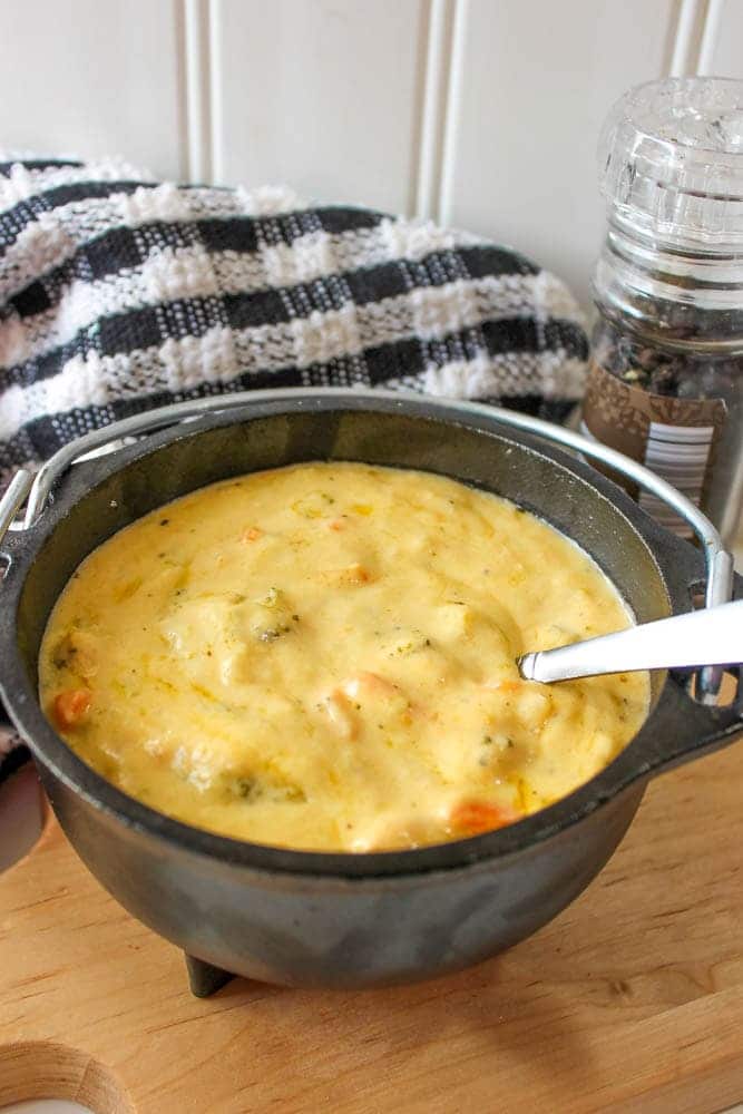 Finished soup in a rustic metal bowl.