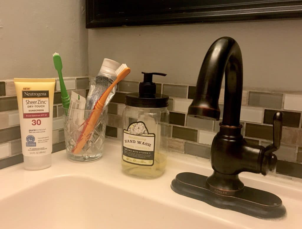 sunscreen next to toothpaste