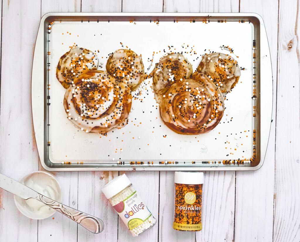 halloween cinnamon rolls in the shape of mickey mouse