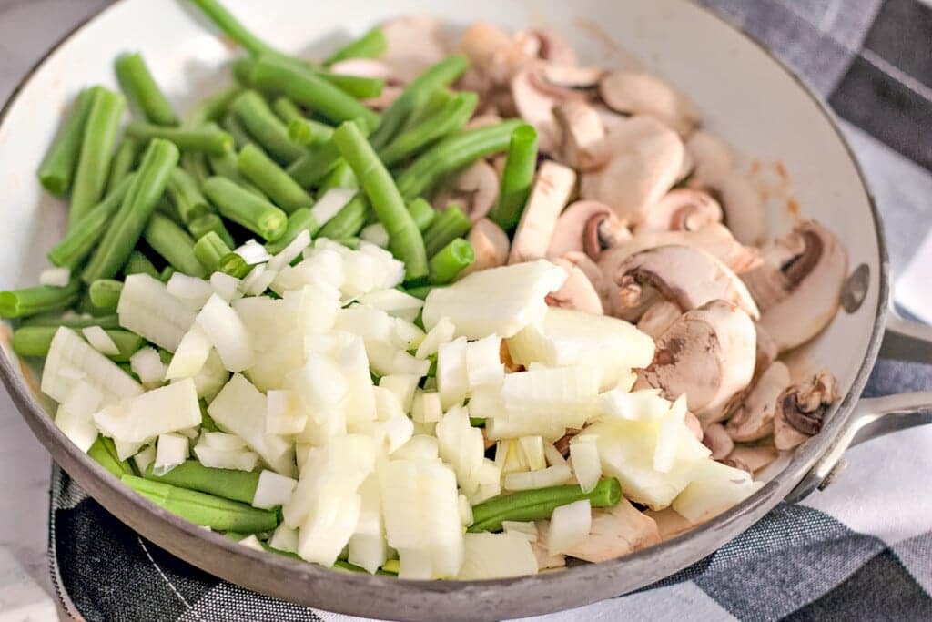 suauteed green beans onions and mushrooms