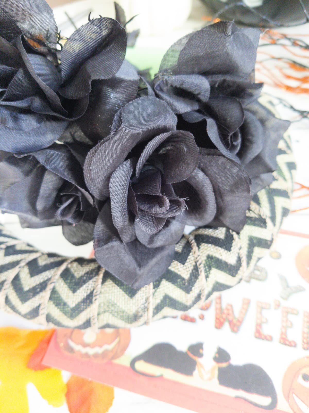 Black silk flowers on wreath