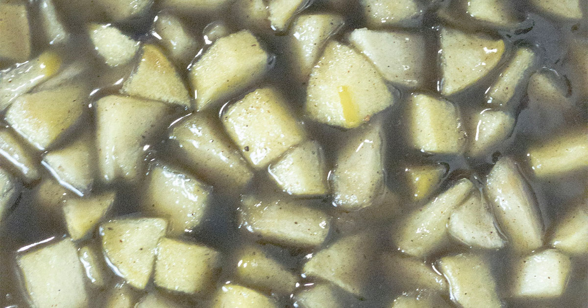 in-process step of making apple mixture for an apple donut