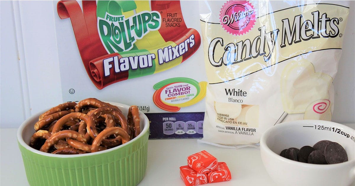 ingredients to make snowman pretzel snacks for christmas