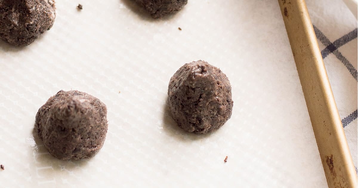 in-process step of forming the reindeer poop truffles from OREO cookies