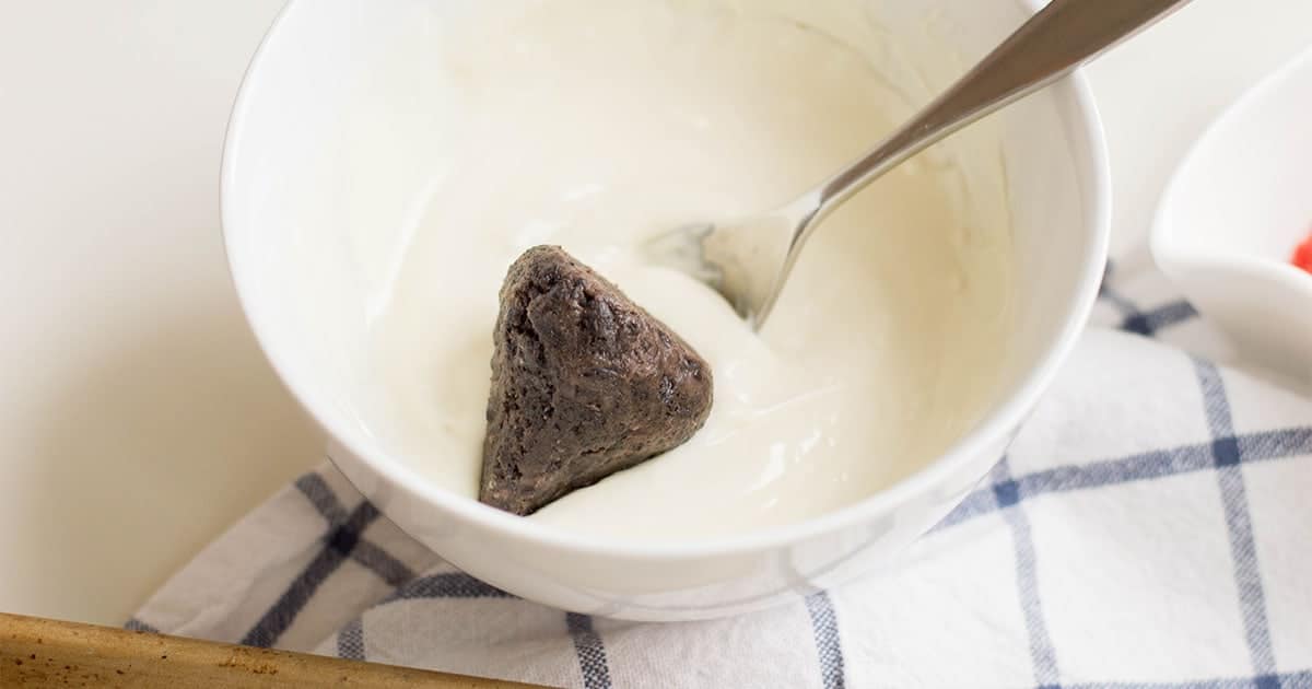 Adding the truffles to the cream.