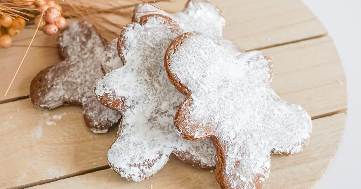 gingerbread man cookies on a wood round