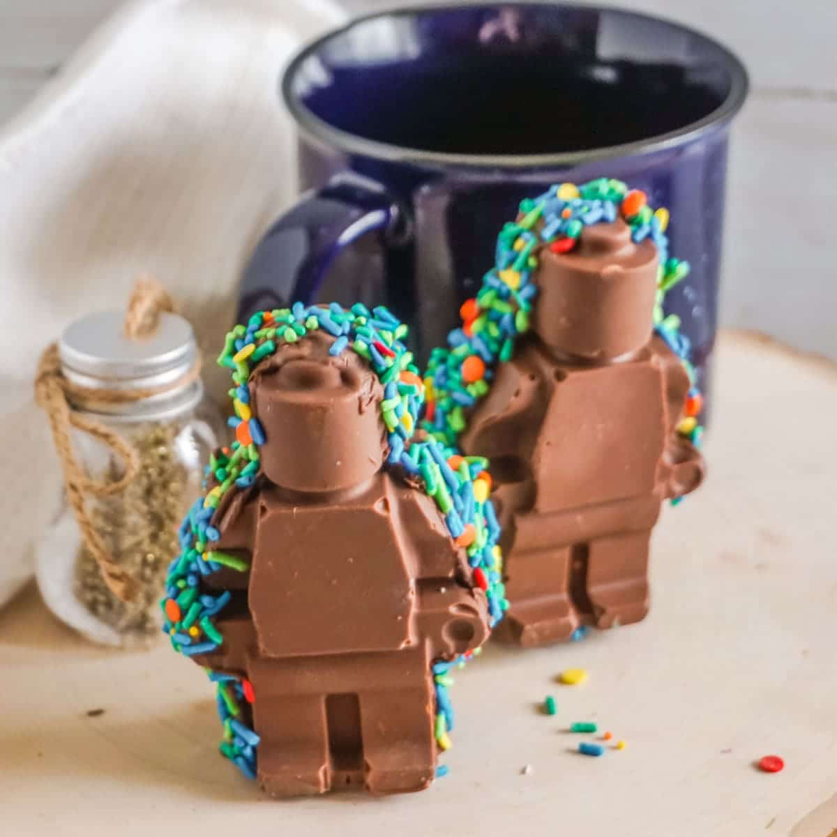 two 3D Lego Man Hot Cocoa Bombs