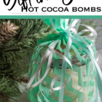 easy diy neighbor gift idea with text which reads gift in a jar hot cocoa bombs