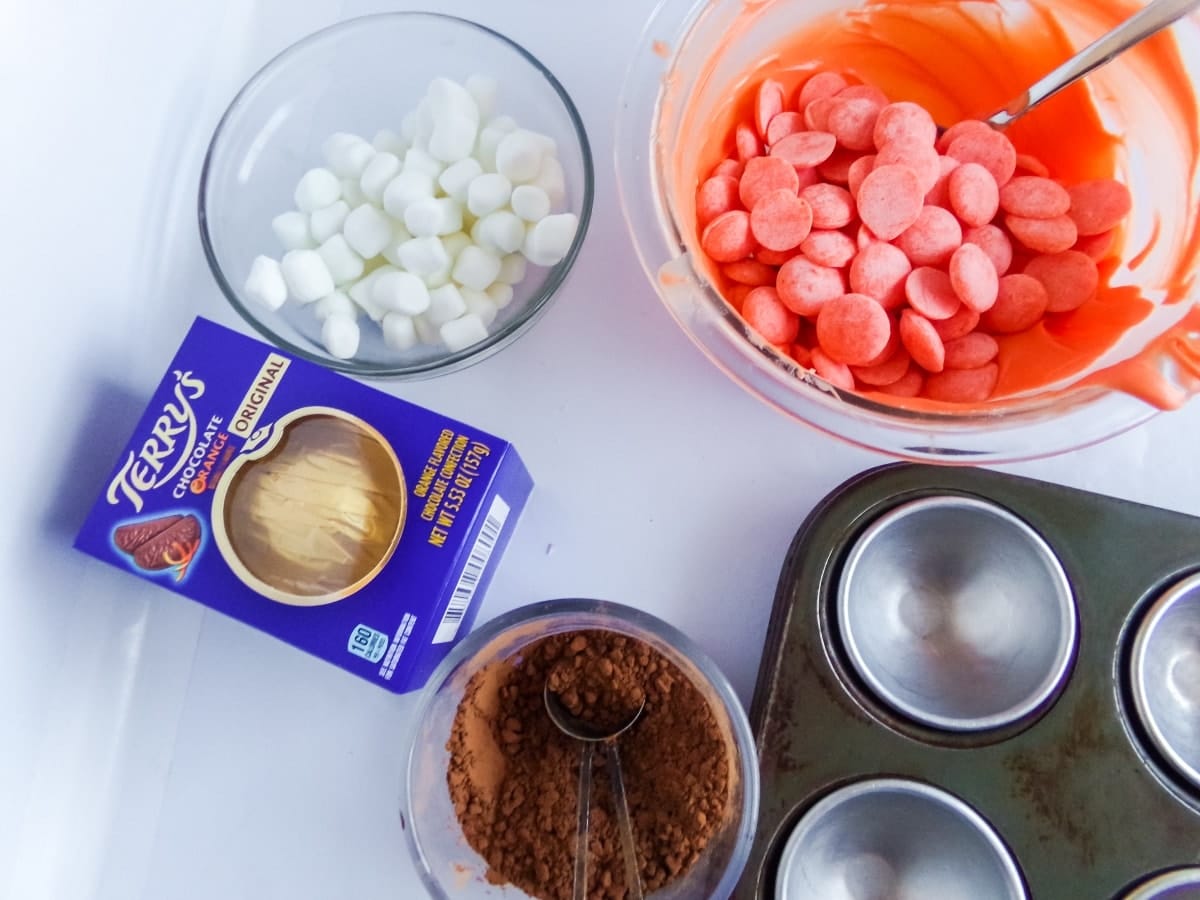 supplies to make Orange Slice Candy Hot Cocoa Bombs