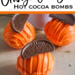 Orange Slice Candy Hot Cocoa Bombs with text which reads orange candy hot cocoa bombs