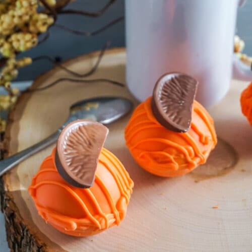 overhead view of Orange Slice Candy Hot Cocoa Bombs