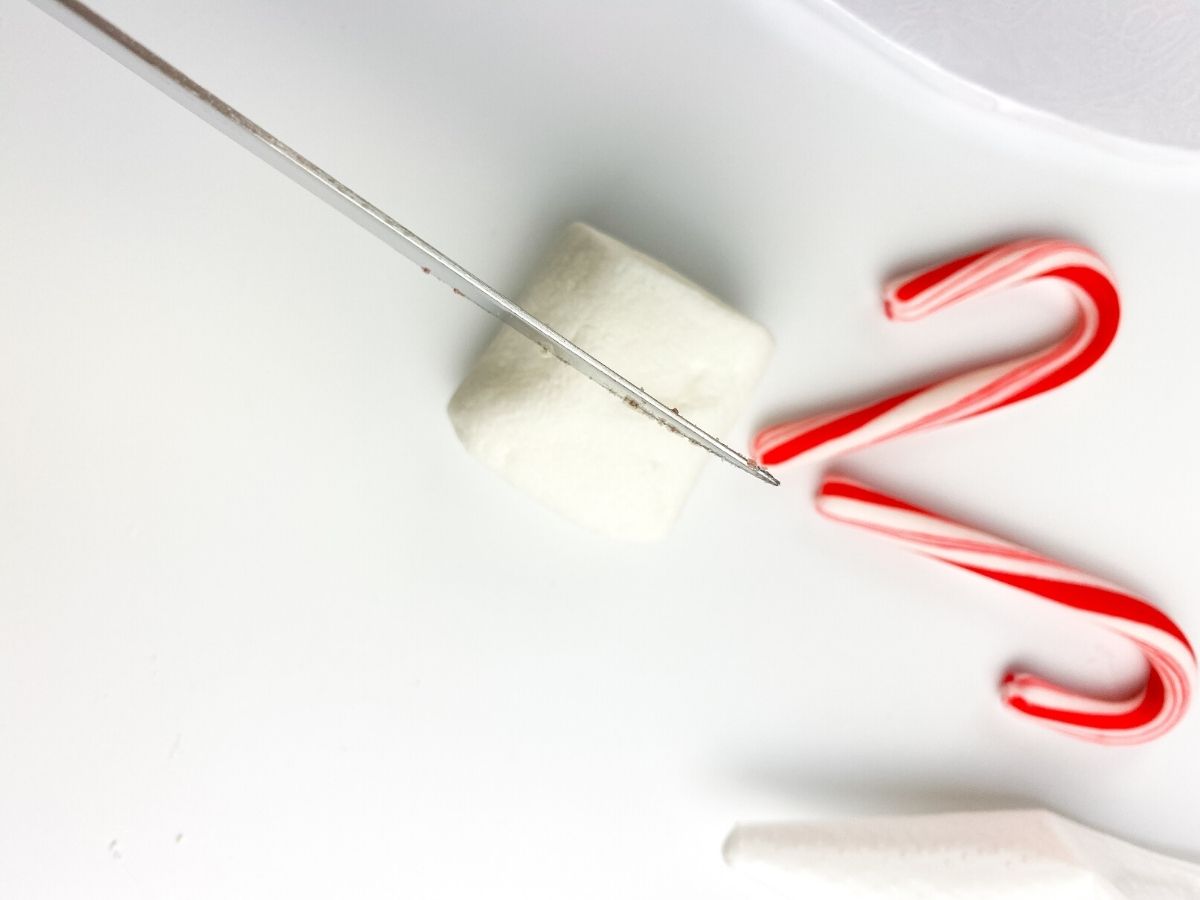 Adding marshmallow to candy cane