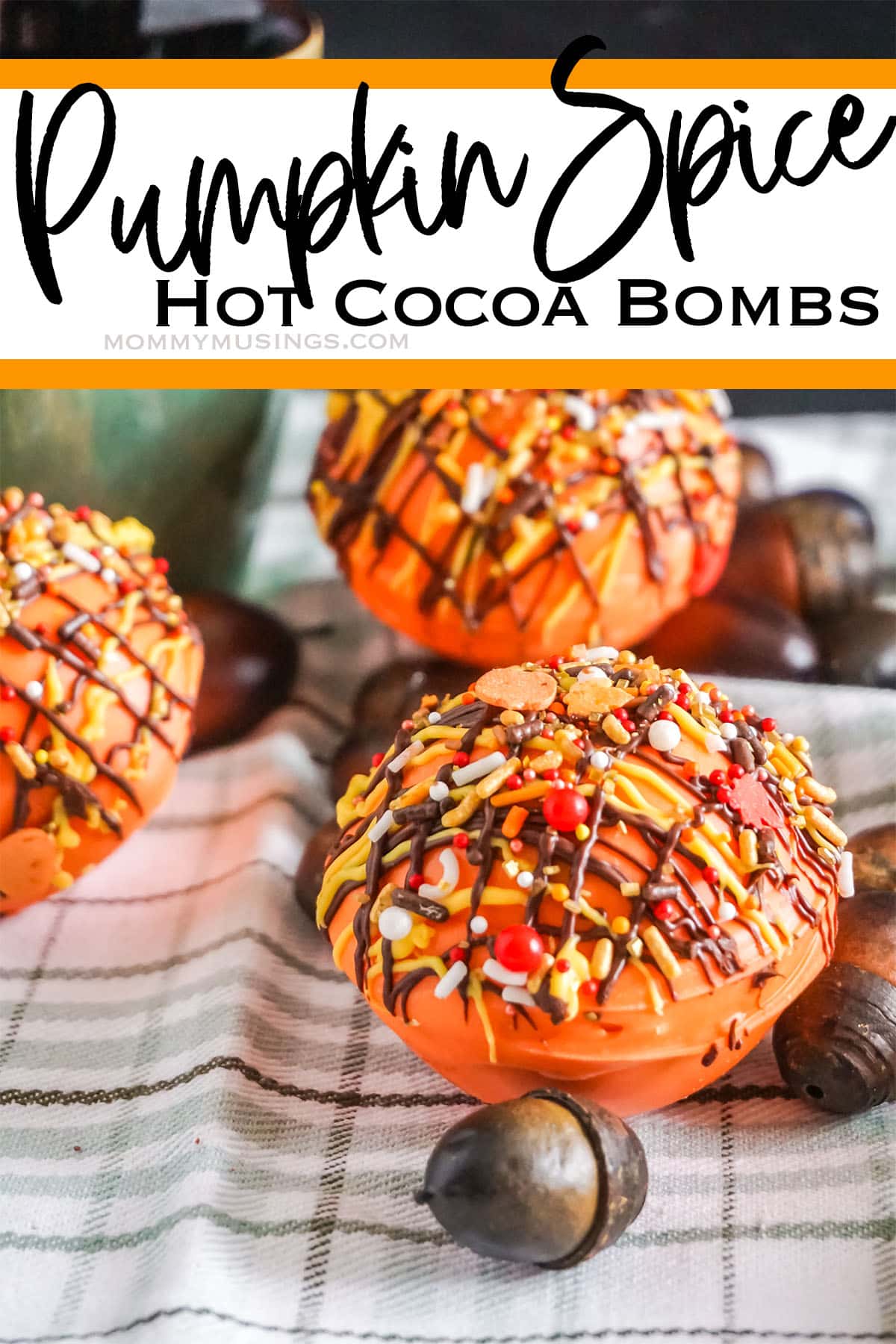 pumpkin spice hot cocoa bombs with text which reads pumpkin spice hot cocoa bombs