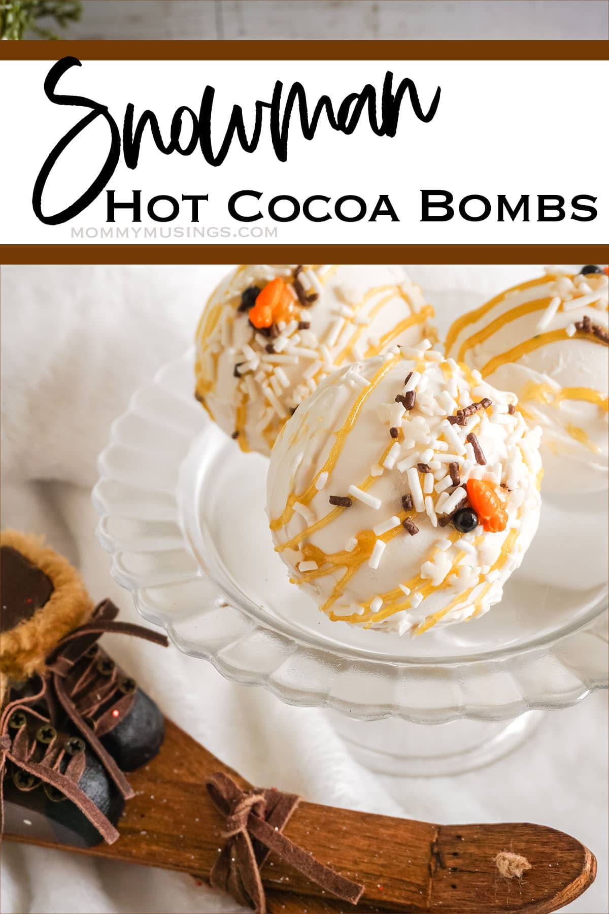 white chocolate hot cocoa bombs with text which reads Snowman Hot Cocoa Bombs 