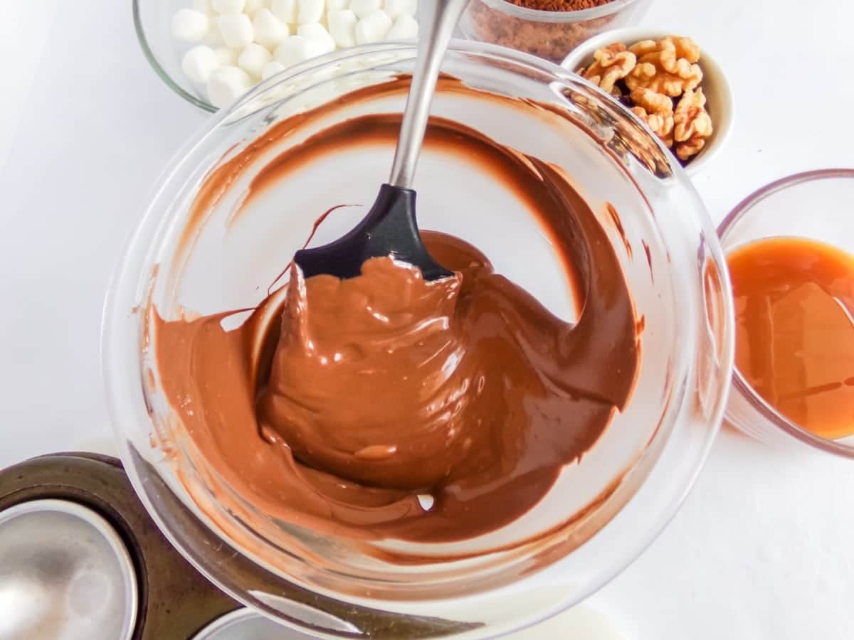 melting chocolate to make turtle hot cocoa bombs