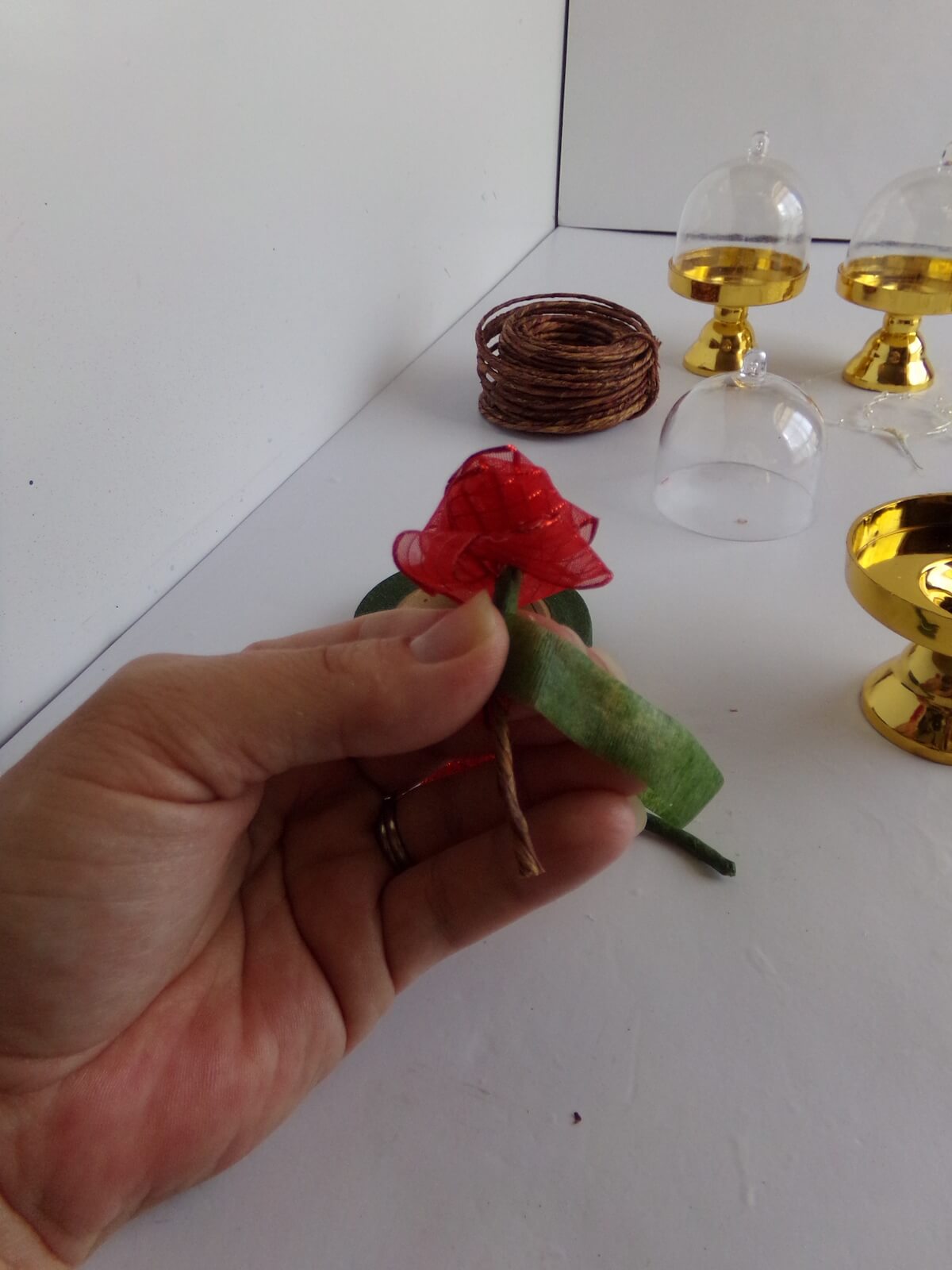 attaching a stem to rolled ribbon rose to make a belle ornament