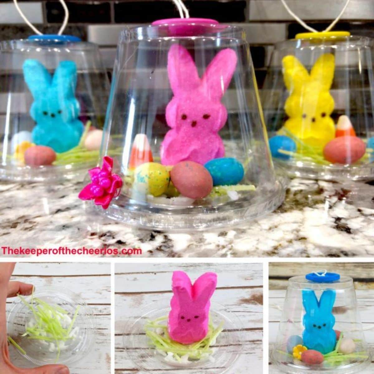 3 colored bunnies sit under plastic tubs surrounded by chocolate eggs in candy colors