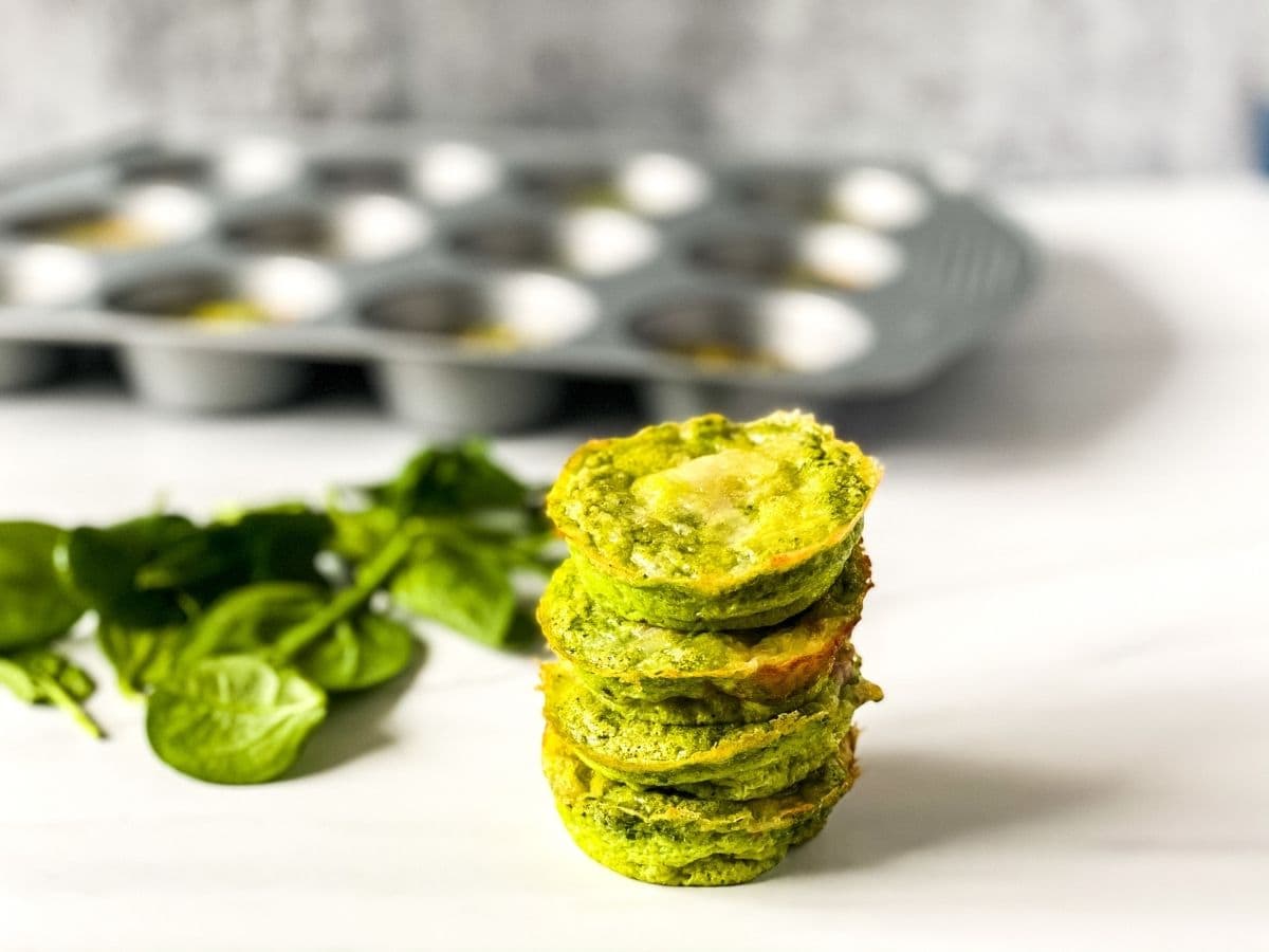 Stack of green eggs and ham muffins