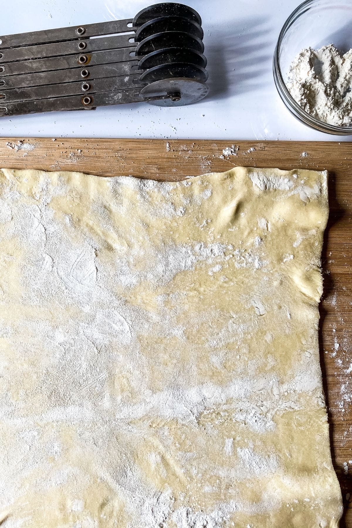 Puff pastry on cutting board