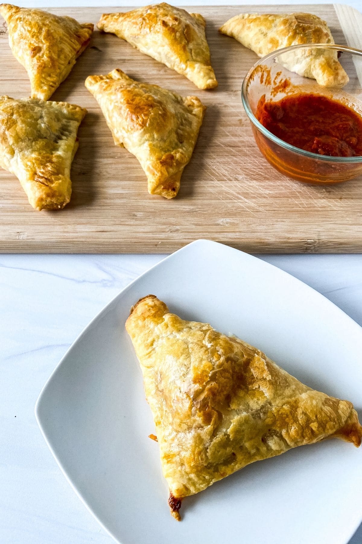 Puff pastry pizza snack on plate