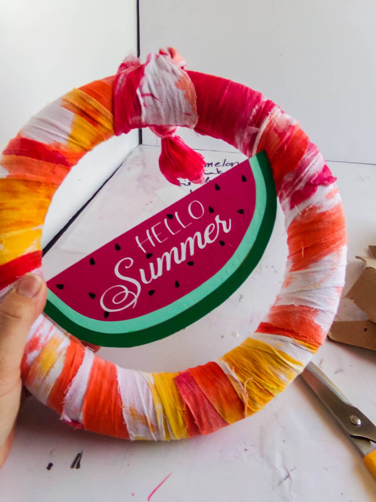 final step of assembling a summer wreath circut craft