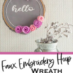 easy cricut craft wreath idea with text which reads faux embroidery hoop wreath