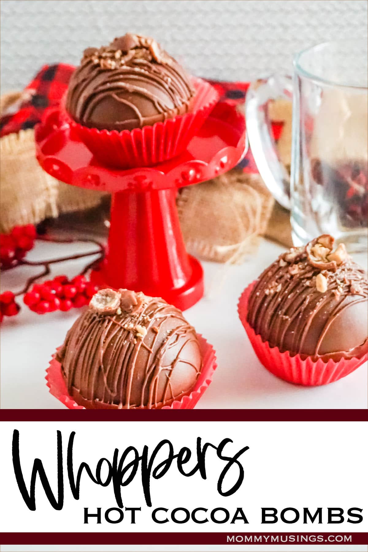 hot chocolate bombs with candy on top with text which reads Whoppers Hot cocoa Bombs