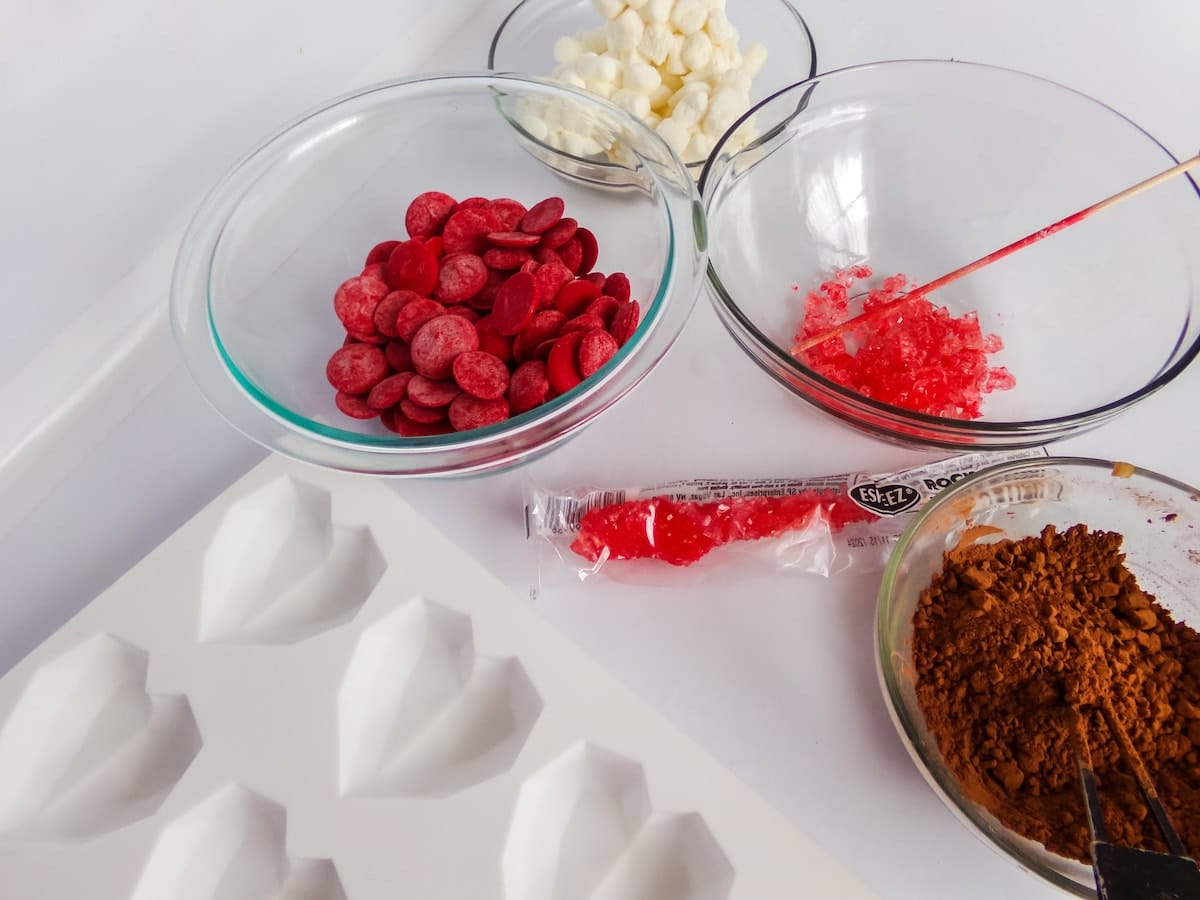 supplies to make Red Heart Rock Candy Hot Cocoa Bombs