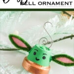 baby yoda christmas ornament diy with text which readsbaby yoda bell ornament