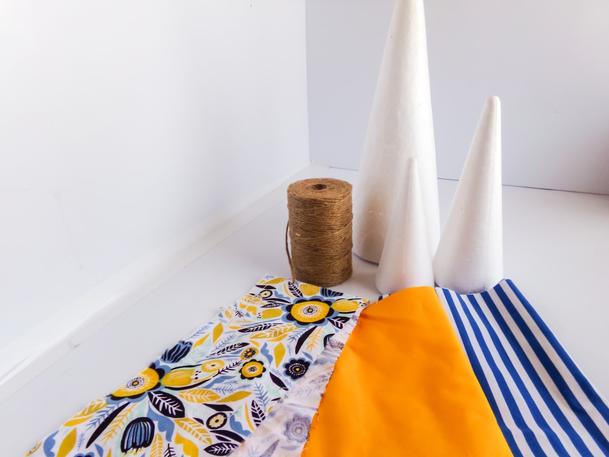 supplies to make a farmhouse cone trees for coastal farmhouse decor