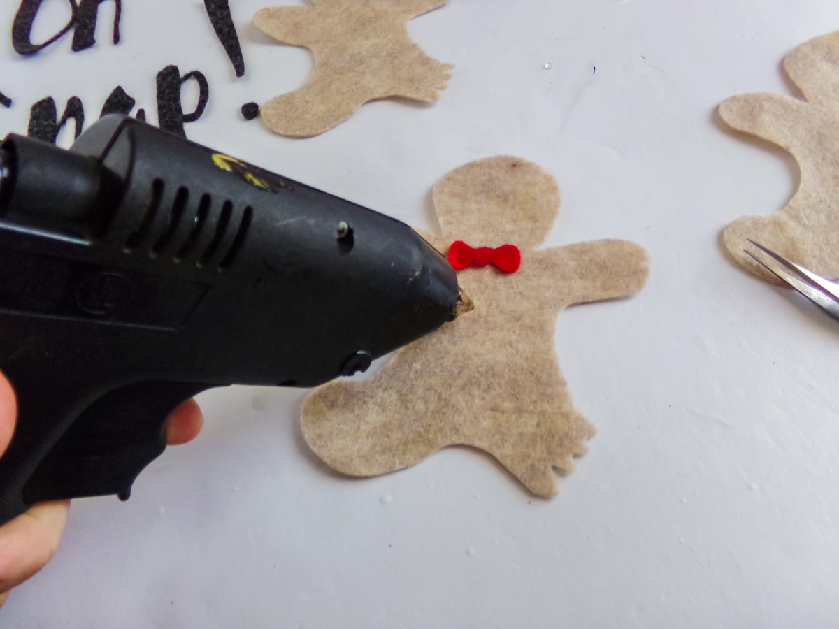 in-process step of making a gingerbread man garland