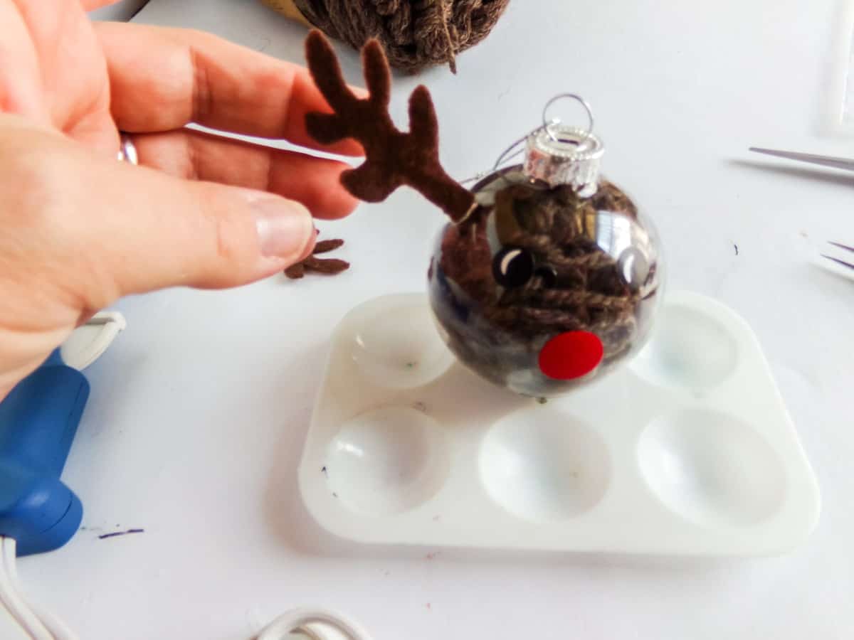 how to attach antlers to a glass ornament to make a rudolph ornament