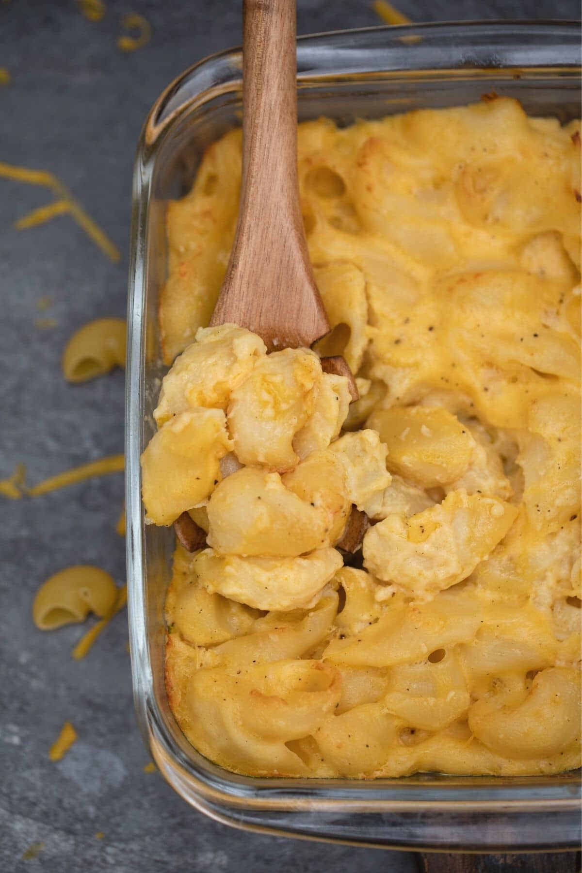 wooden spoon in dish of pasta