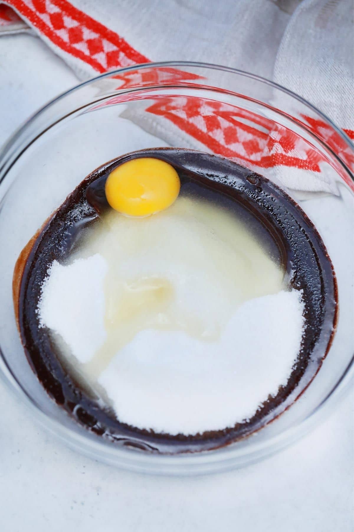 bowl with melted chocolate egg and sugar