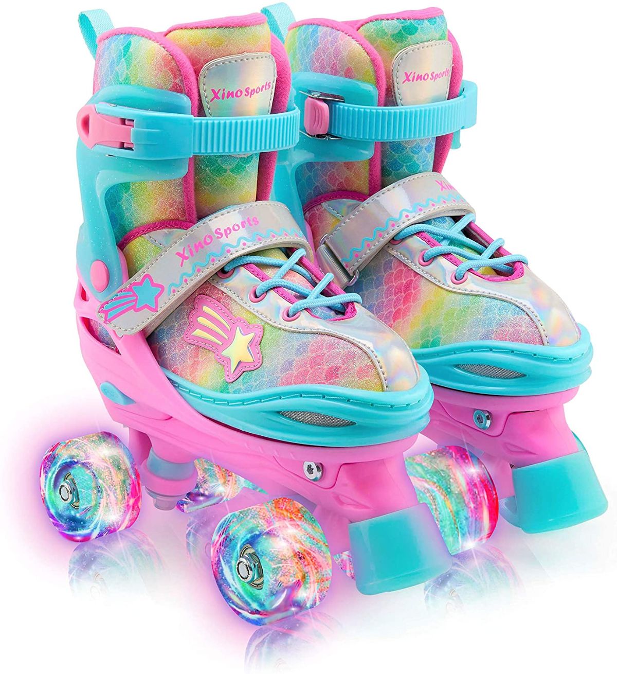 blue and pink roller skates on white background