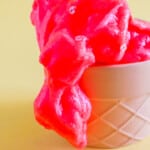 Apple Jelly Cube Slime spilling from a cup