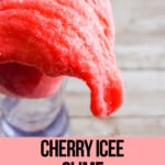 red slime with fake snow with text which reads cherry icee slime