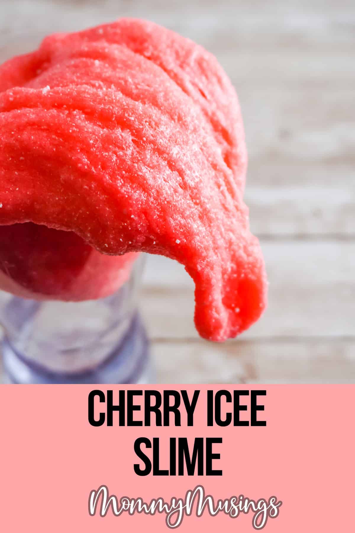 red slime with fake snow with text which reads cherry icee slime