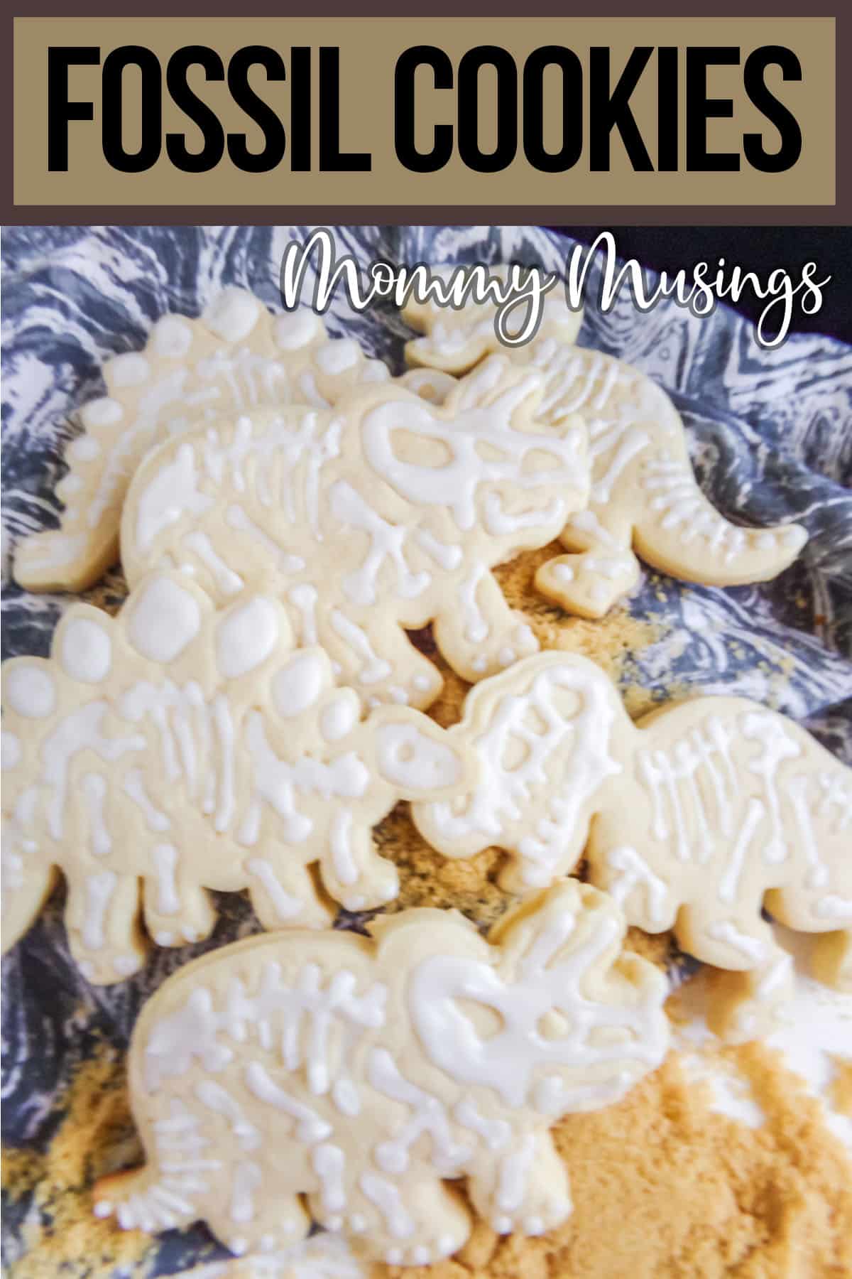 dino fossil flood cookies with text which reads fossil cookies