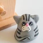 closeup of kitty cat charm made from clay