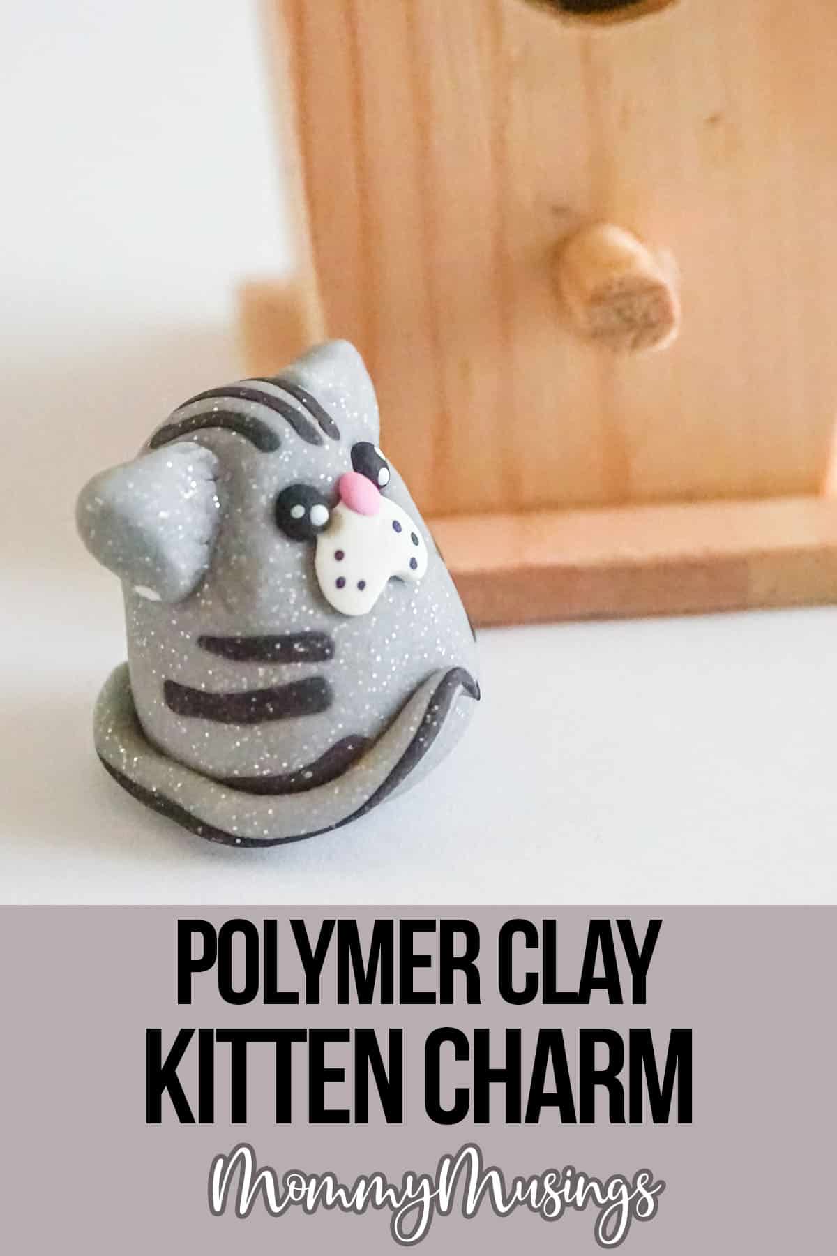 clay cat craft with text which reads polymer clay kitten charm