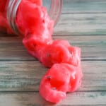 watermelon jelly cube slime spilling onto a table