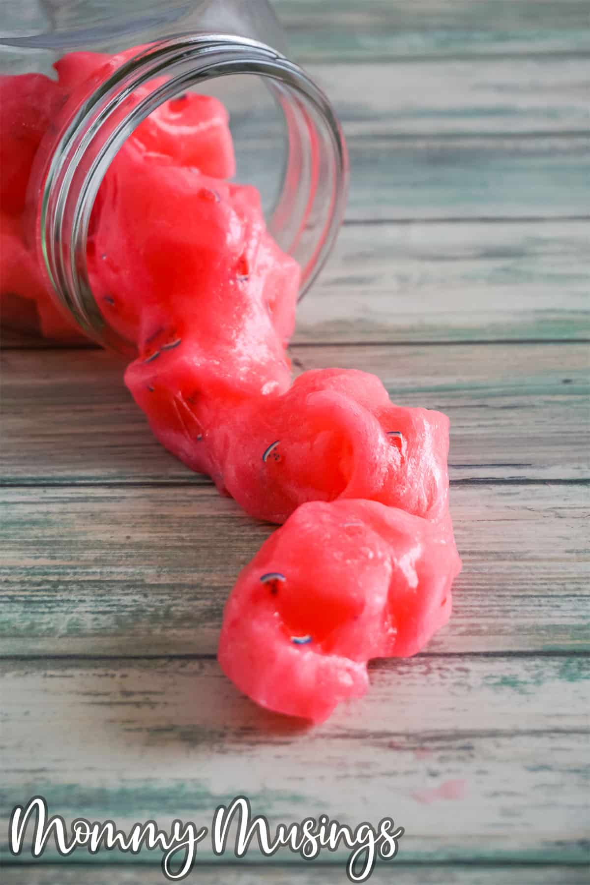 watermelon jelly cube slime spilling onto a table