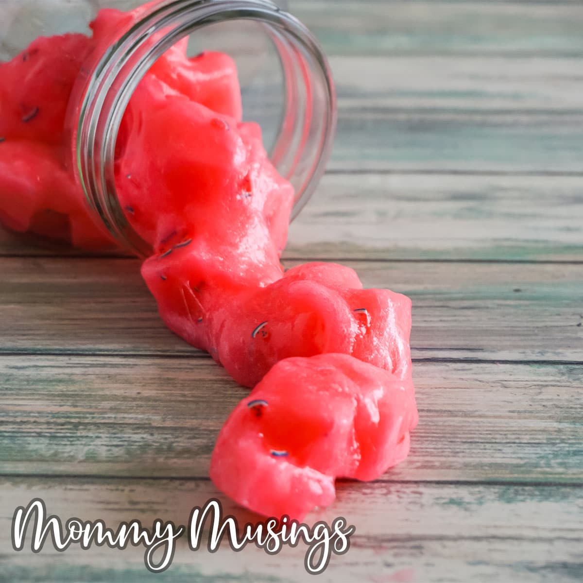 watermelon jelly cube slime spilled onto the table